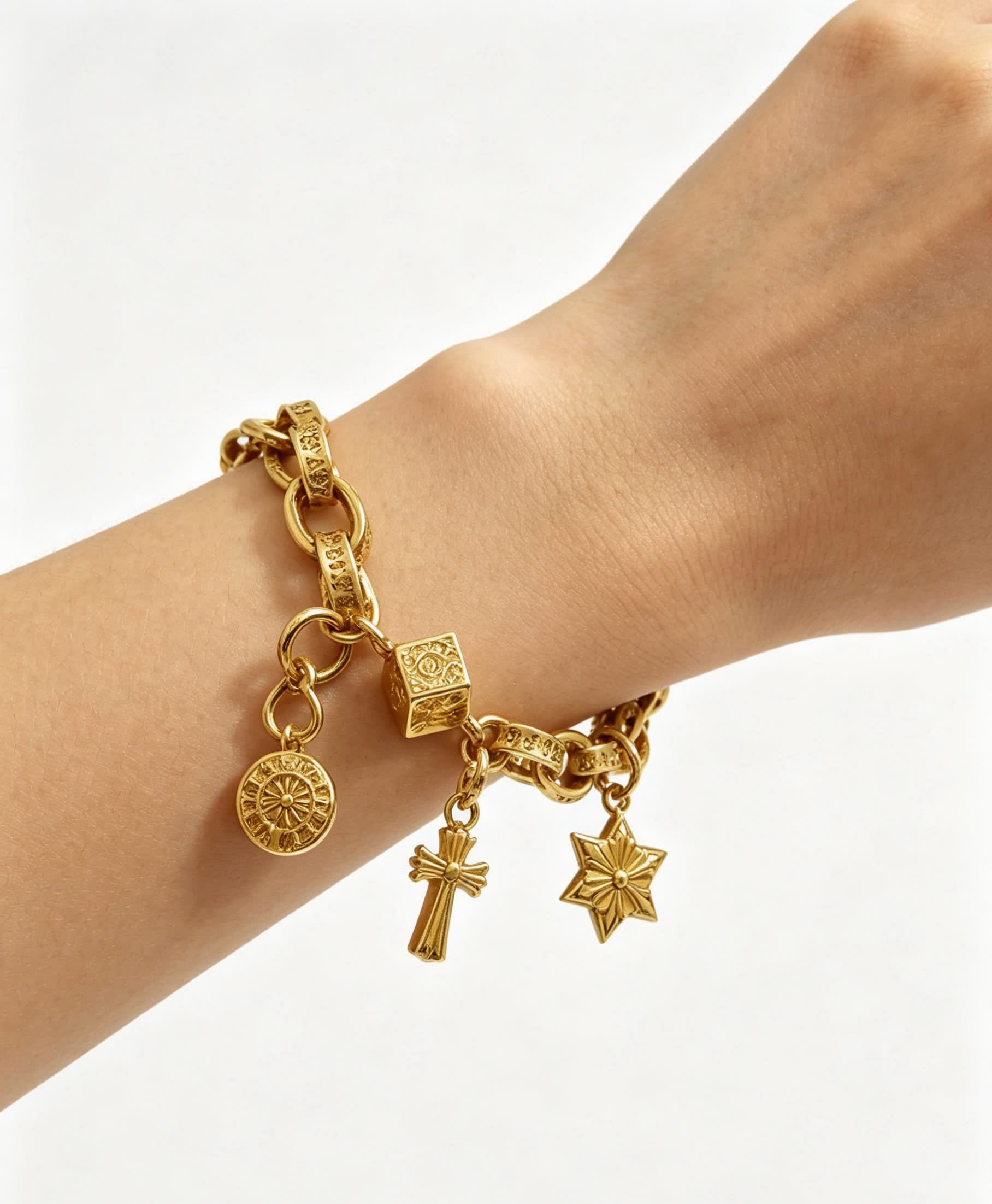 Chrome Hearts Gold Tone Charm Bracelet with Cross, Star, and Coin Charms